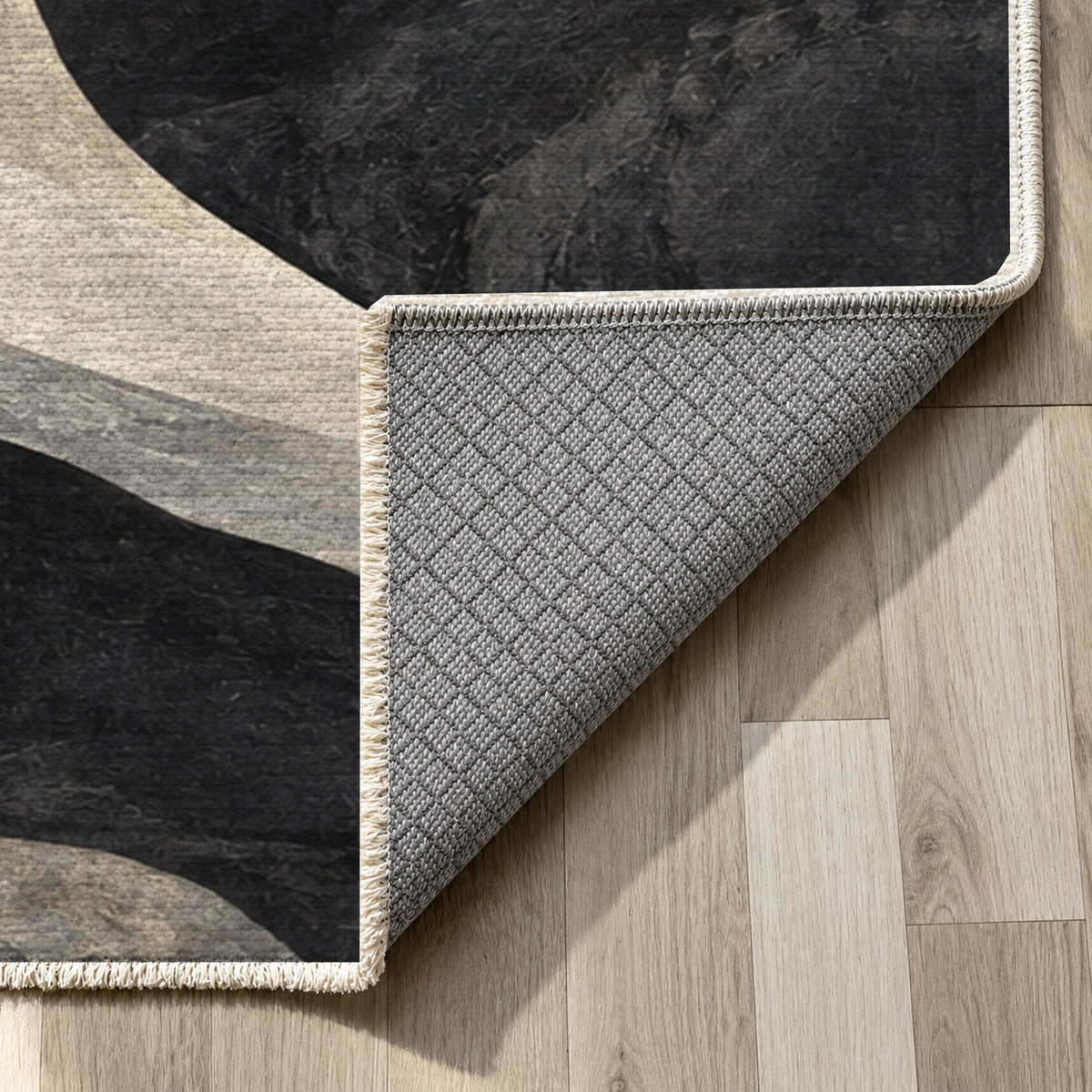 Canyon Shadows Charcoal Modern Washable Rug — backing close up