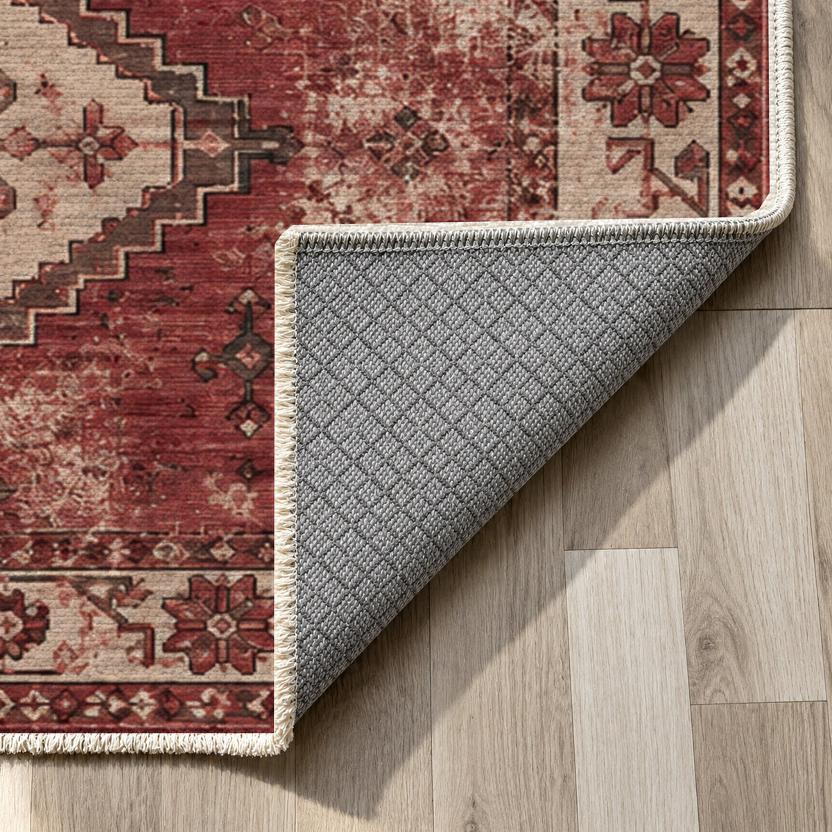 Caravan Fragments Burgundy Red Vintage Washable Rug — backing close up
