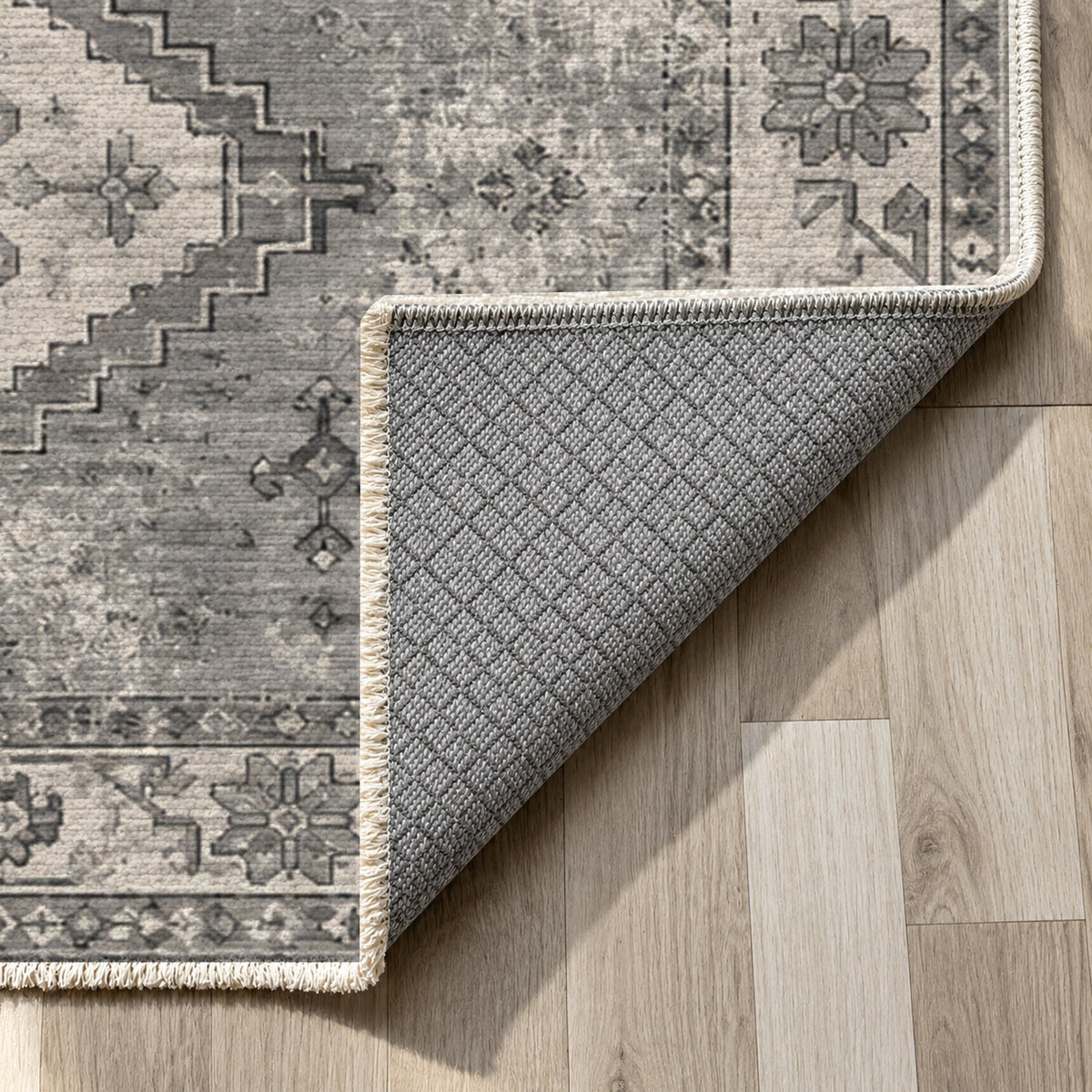 Caravan Fragments Charcoal Silver Vintage Washable Rug — backing close up