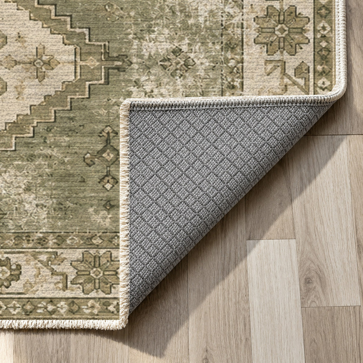 Caravan Fragments Olive Green Vintage Washable Rug — backing close up