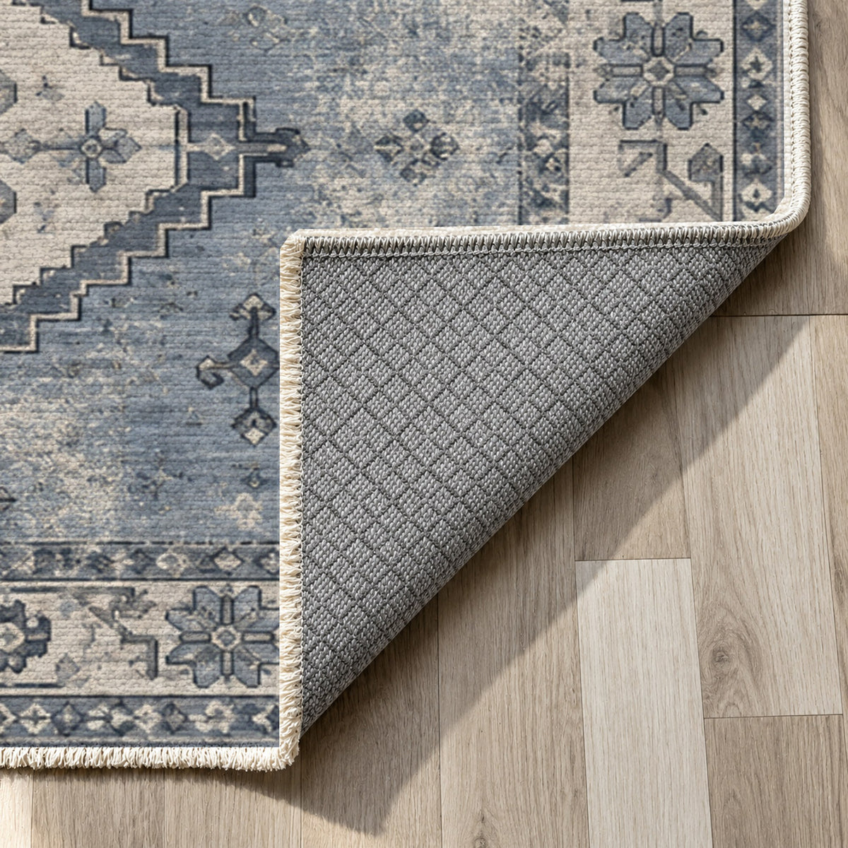 Caravan Fragments Slate Blue Vintage Washable Rug — backing close up