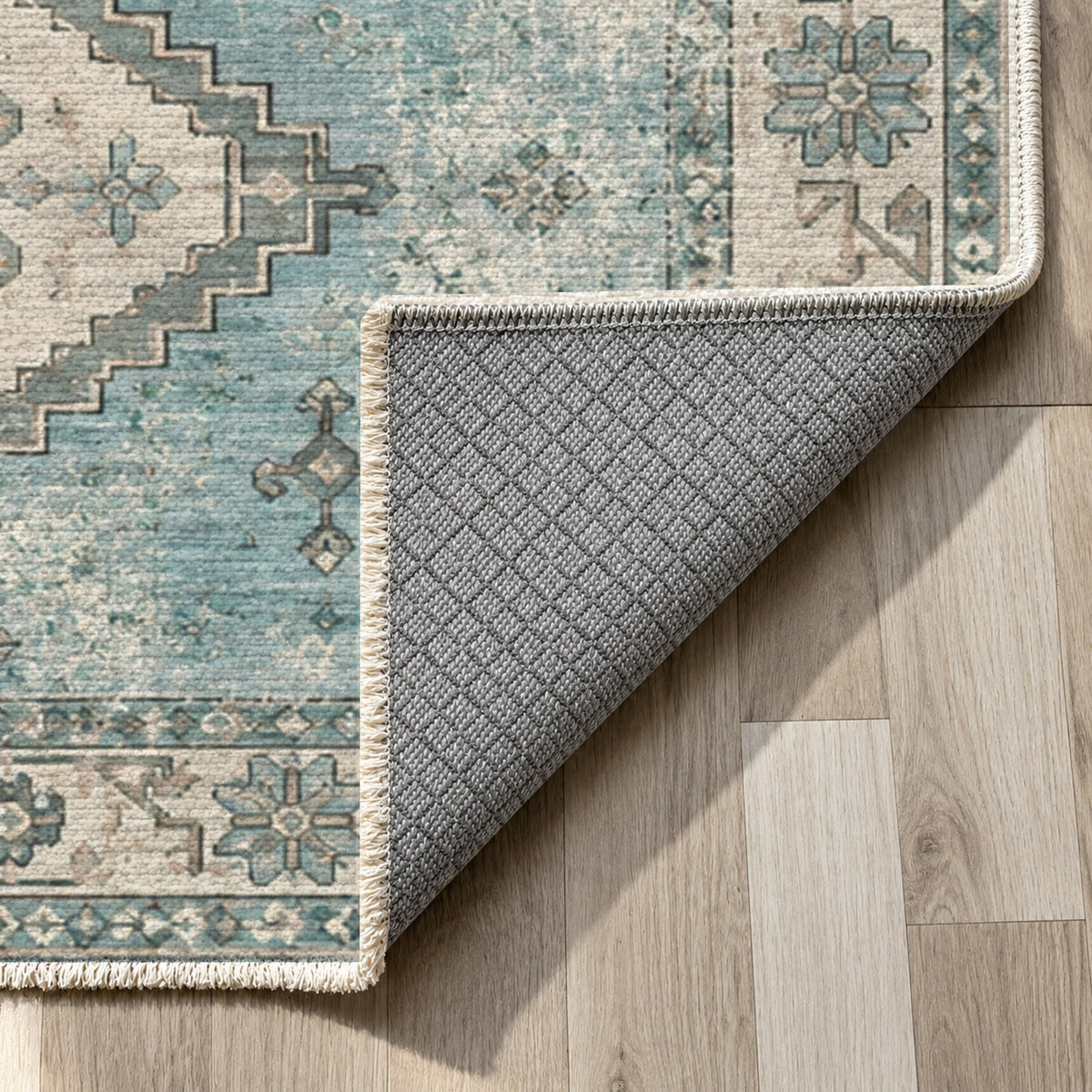 Caravan Fragments Turquoise Blue Vintage Washable Rug — backing close up