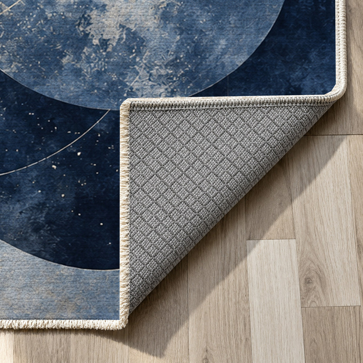 Celestial Orbits Indigo Abstract Washable Rug — backing close up