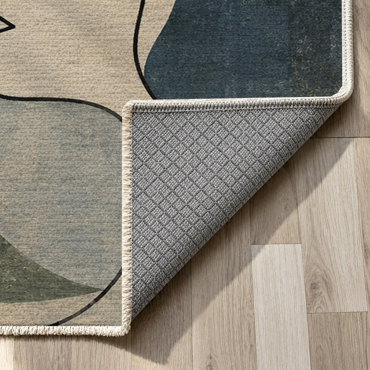 Conversation Abstract Washable Rug — backing close up