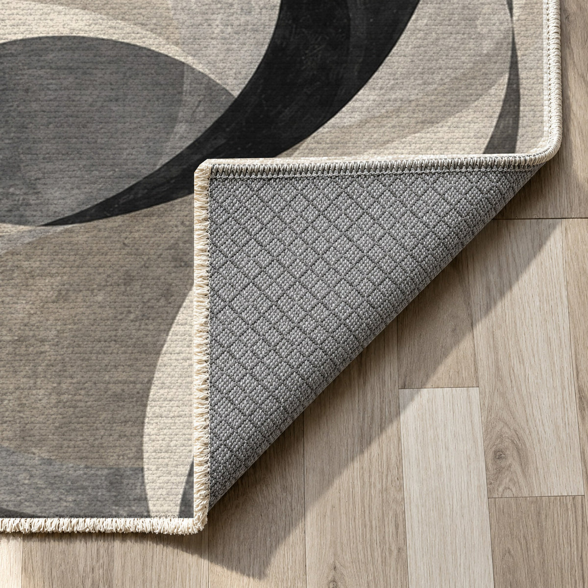 Dancing Lines Charcoal Abstract Washable Rug — backing close up