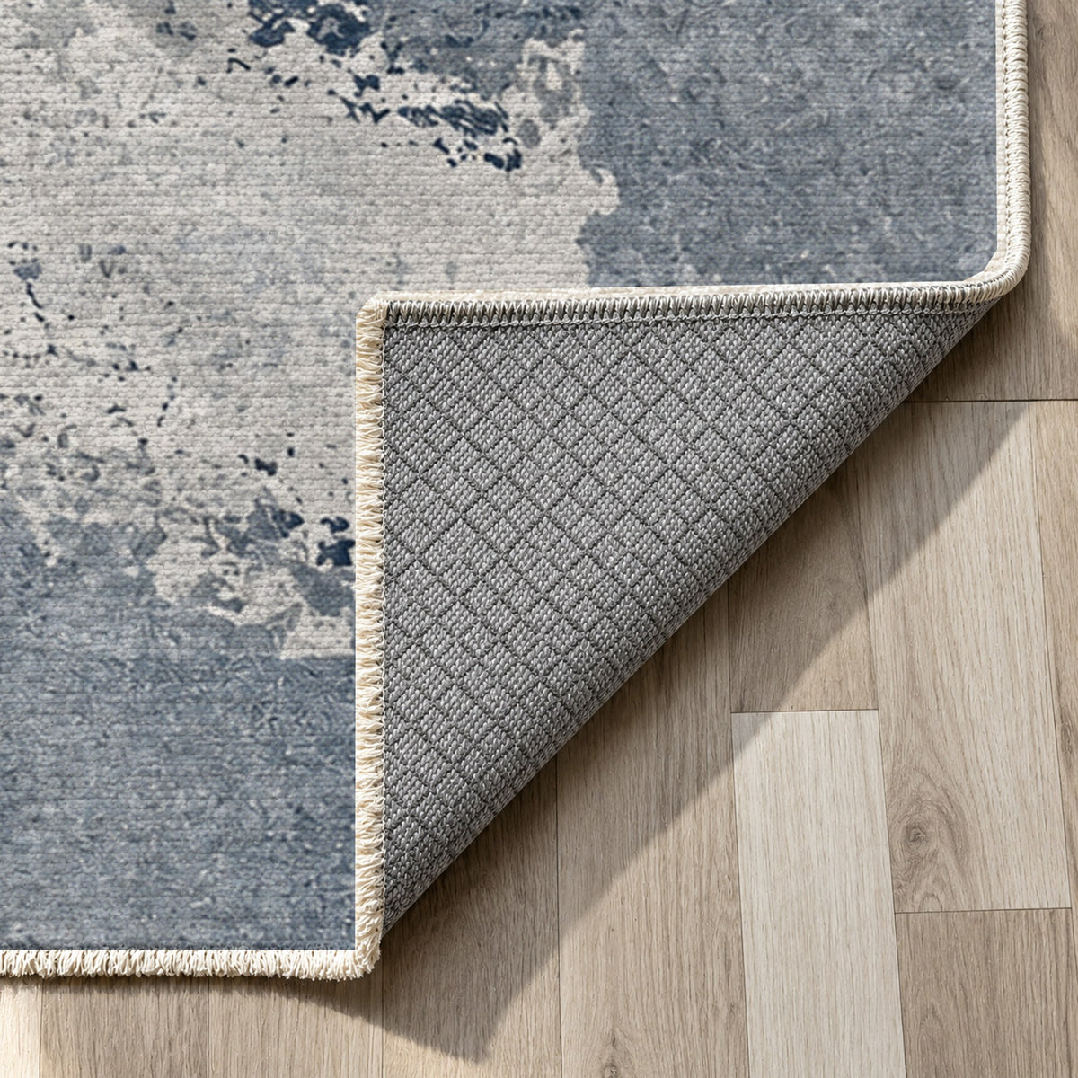 Earth Pigment Blue Grey Abstract Washable Rug — backing close up