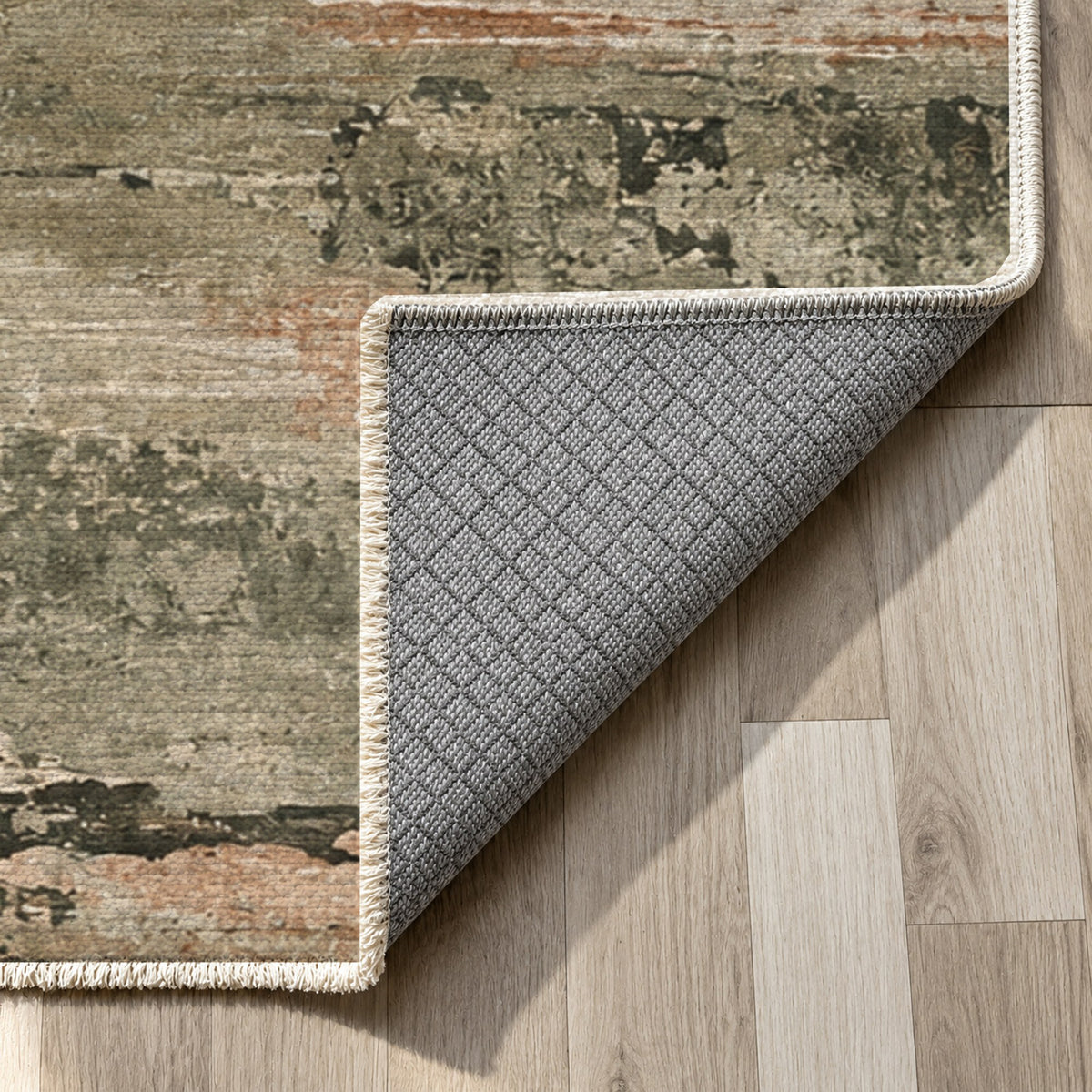 Eroded Strata Sage Clay Abstract Washable Rug — backing close up