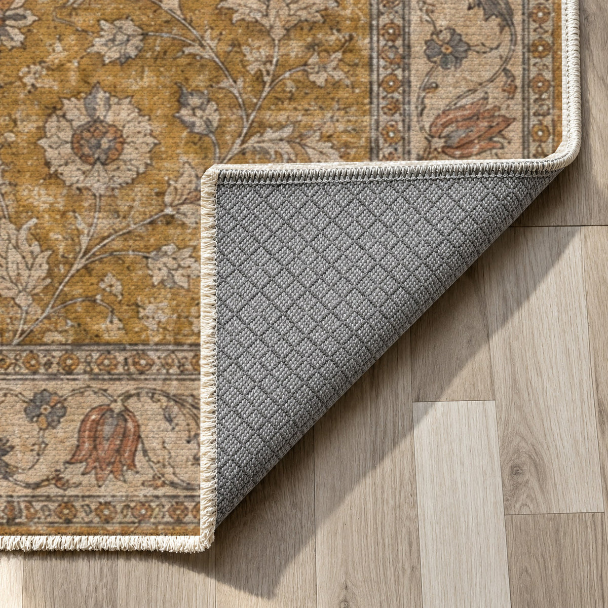 Faded Floral Antique Gold Vintage Washable Rug — backing close up