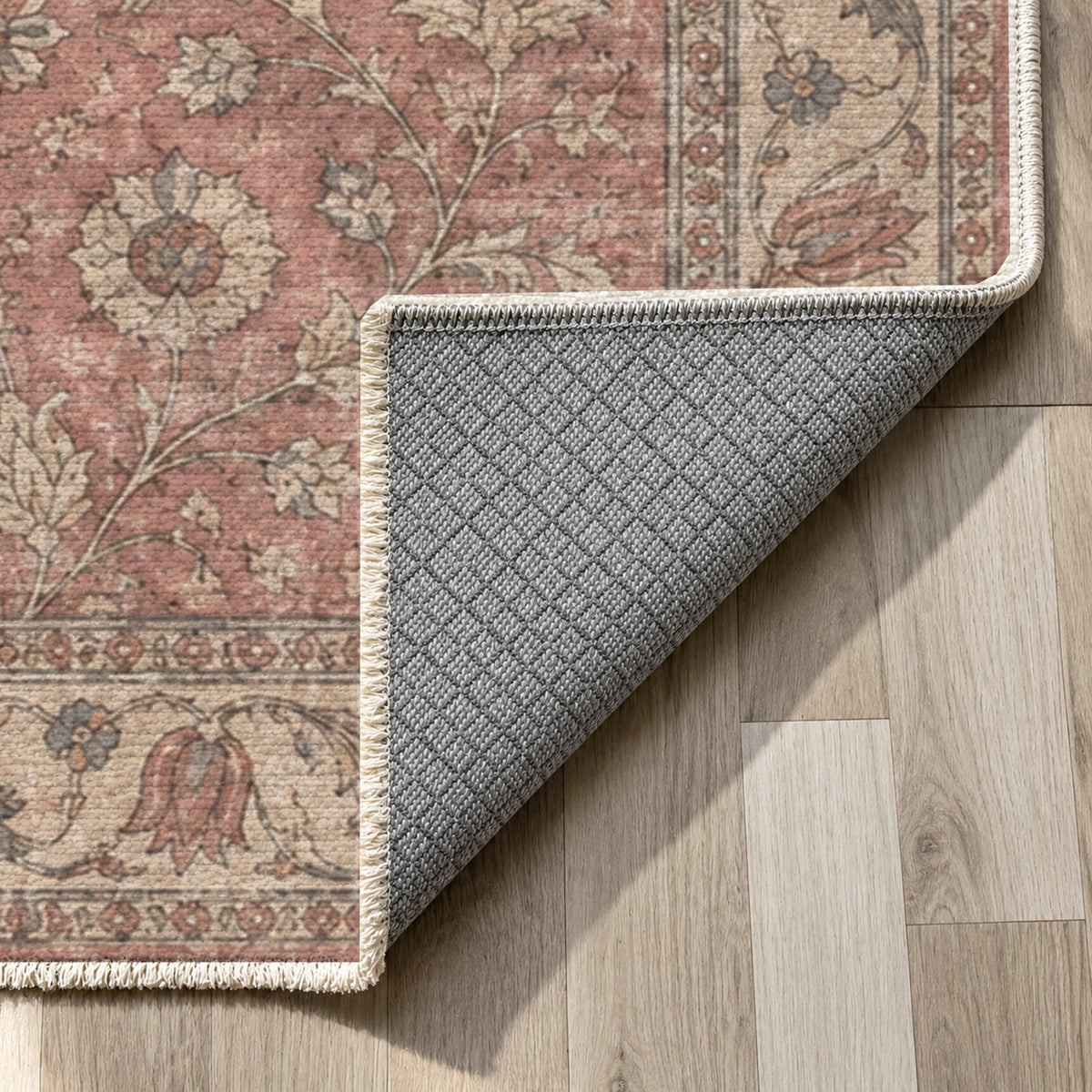 Faded Floral Dusty Rose Vintage Washable Rug — backing close up