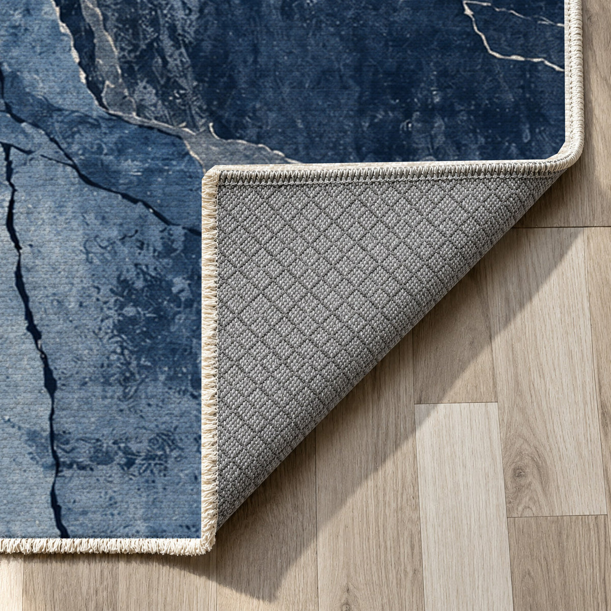 Fault Lines Indigo Abstract Washable Rug — backing close up