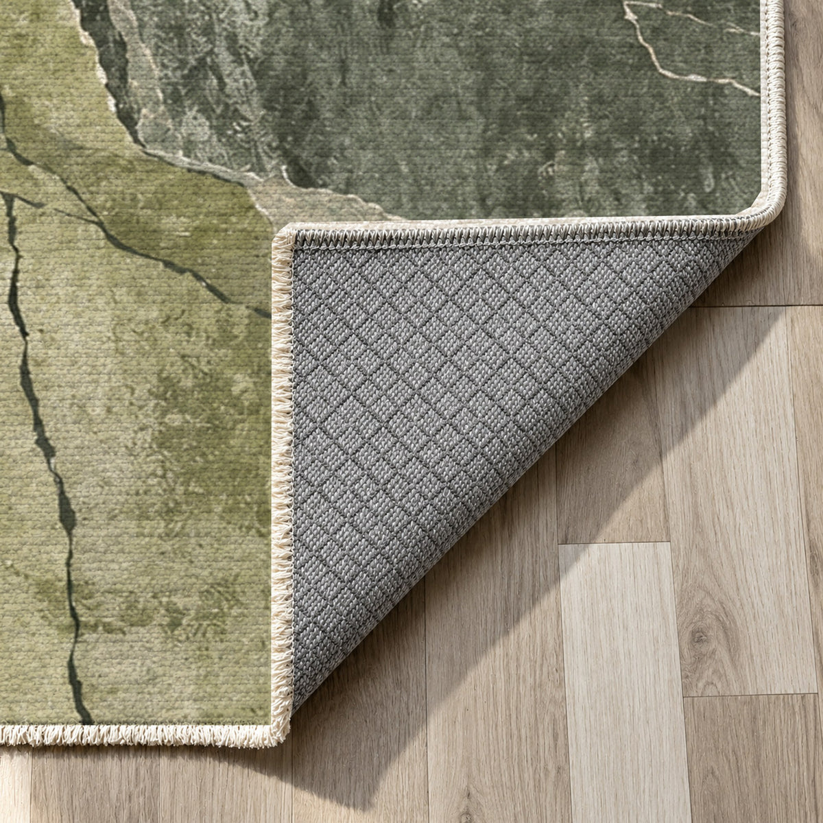 Fault Lines Sage Abstract Washable Rug — backing close up