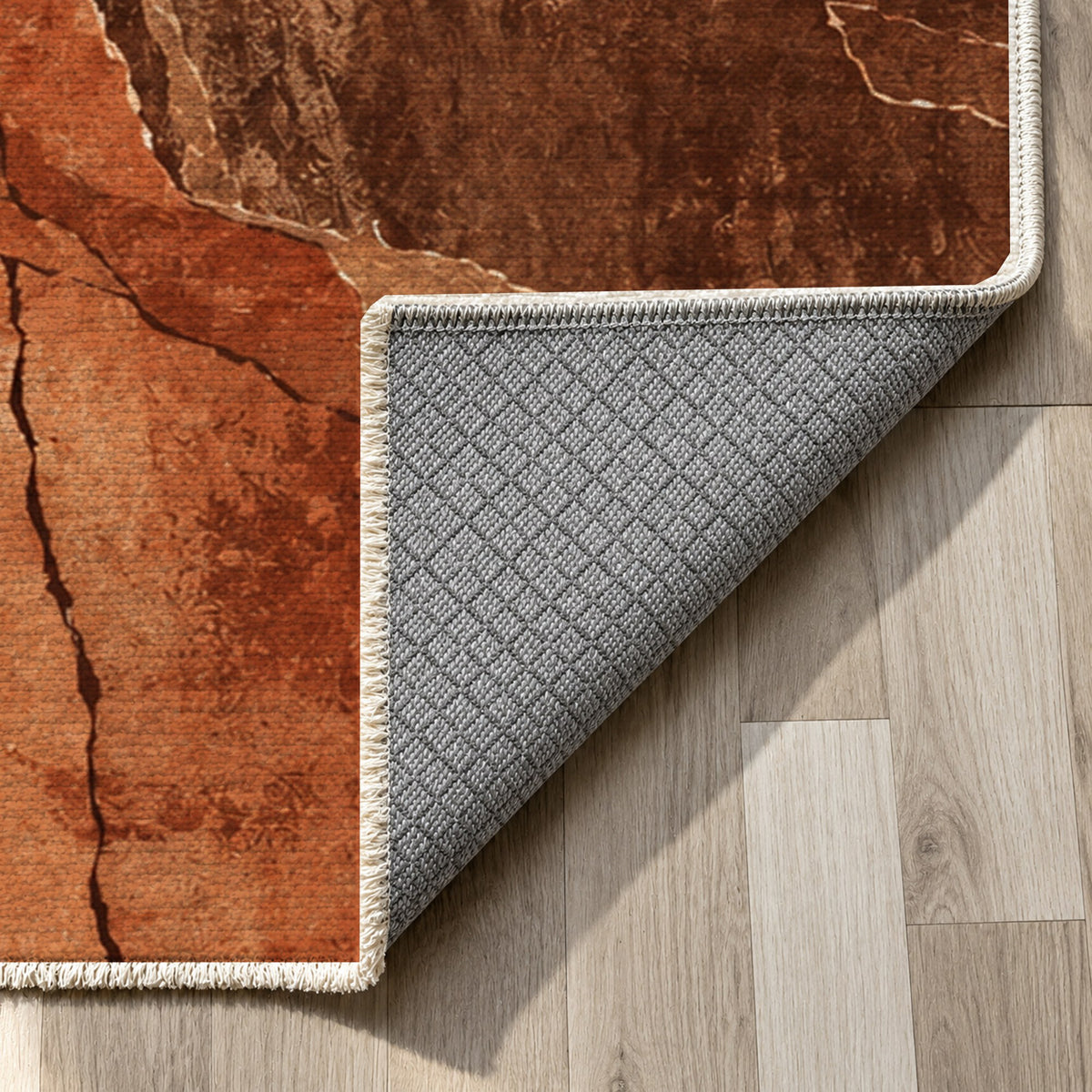 Fault Lines Terracotta Abstract Washable Rug — backing close up