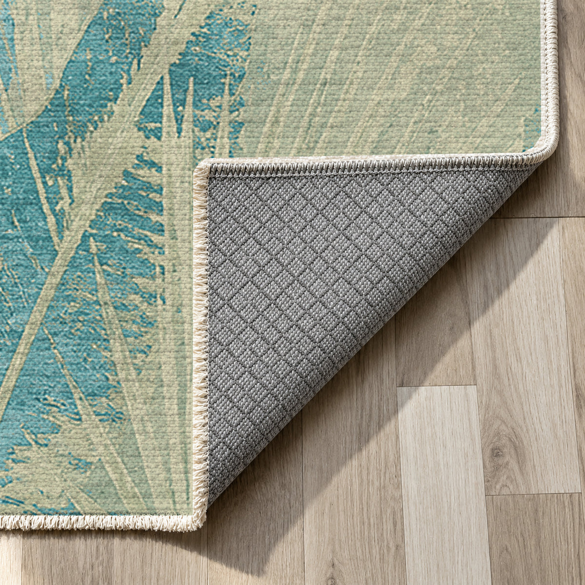 Frond Aqua Abstract Washable Rug — backing close up