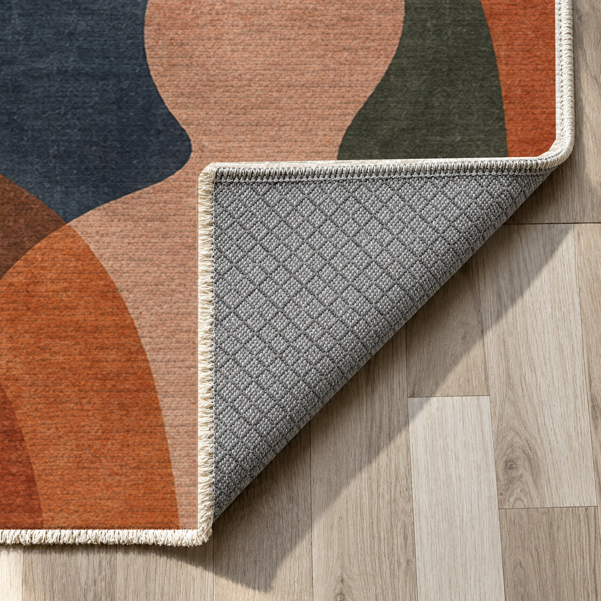 Gathering Shapes Abstract Washable Rug — backing close up