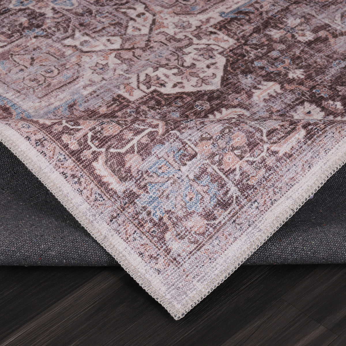 Germanica Washable R2 — washable r2 rose mauve medallion folded corner close up rug 17