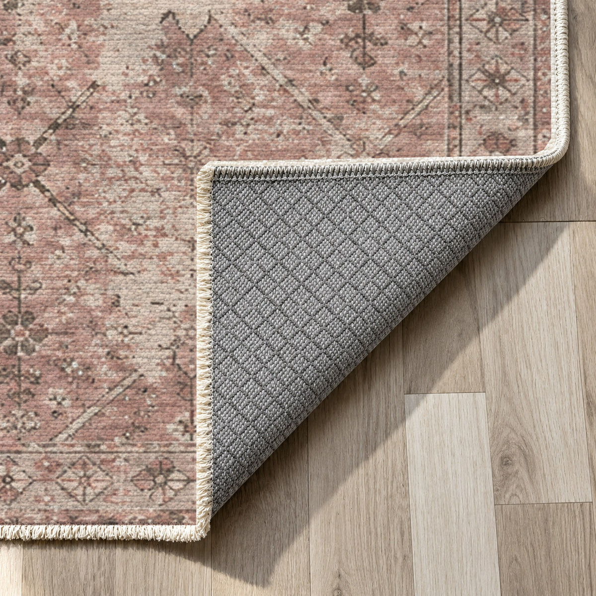 Ghost Lattice Rose Pink Vintage Washable Rug — backing close up