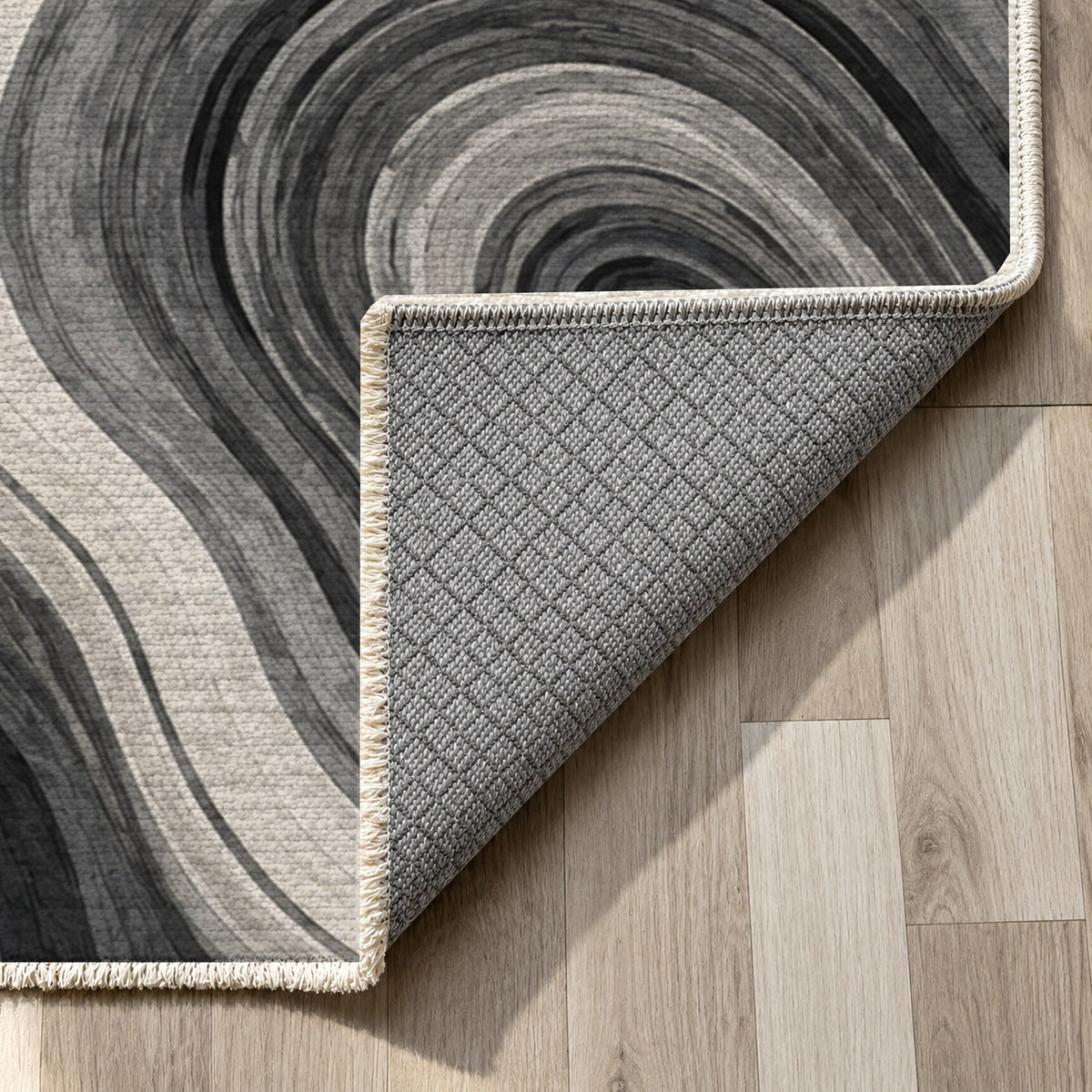 Growth Rings Charcoal Floral Washable Rug — backing close up