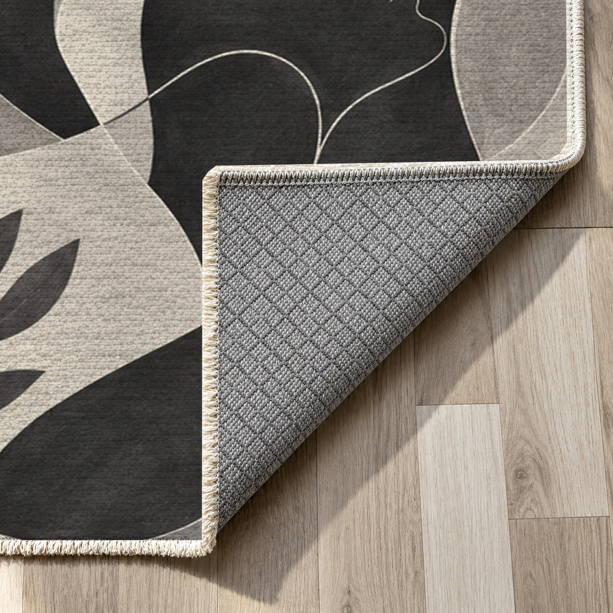 Human Connections Charcoal Abstract Washable Rug — backing close up