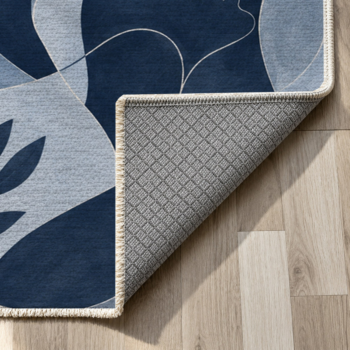 Human Connections Indigo Abstract Washable Rug — backing close up