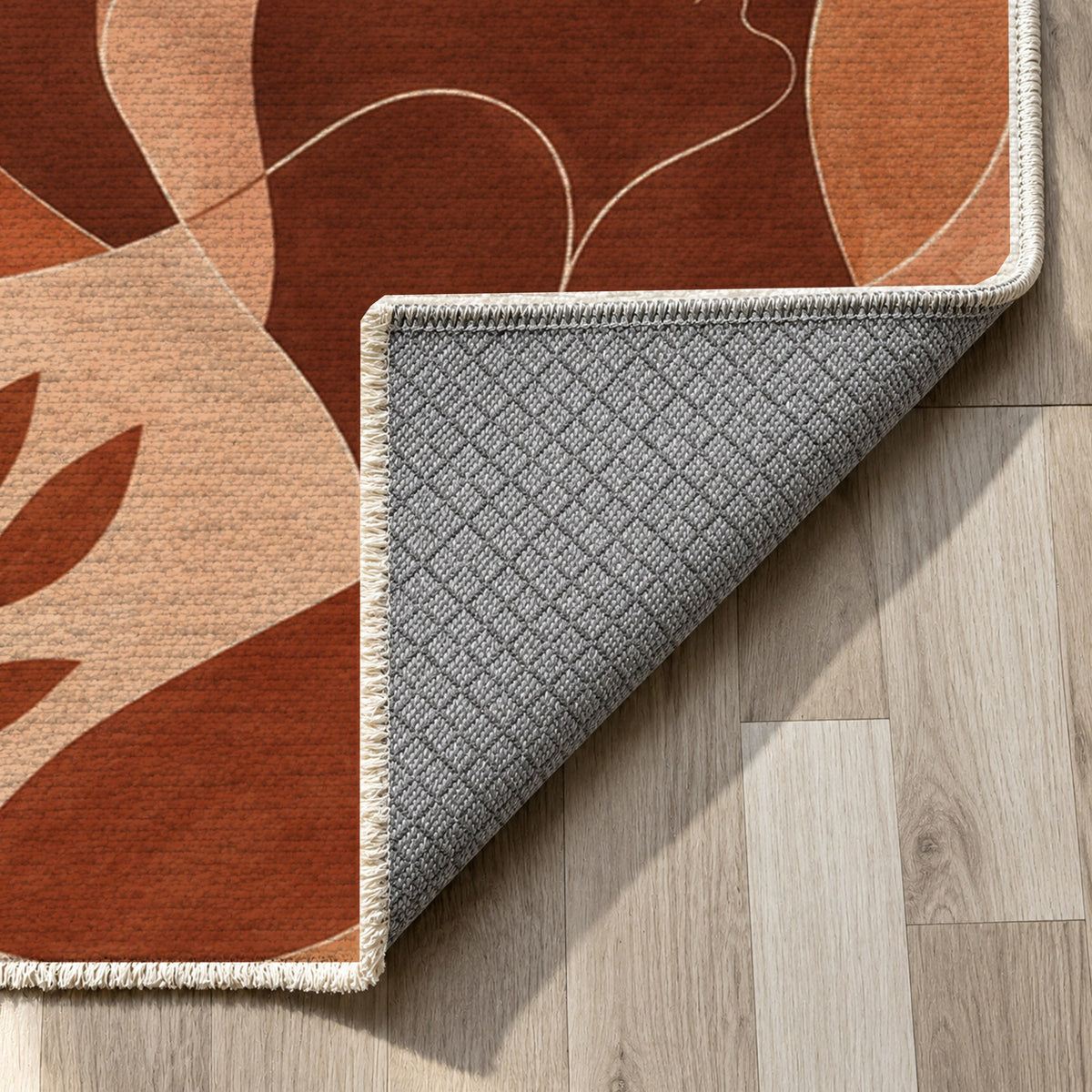 Human Connections Terracotta Abstract Washable Rug — backing close up