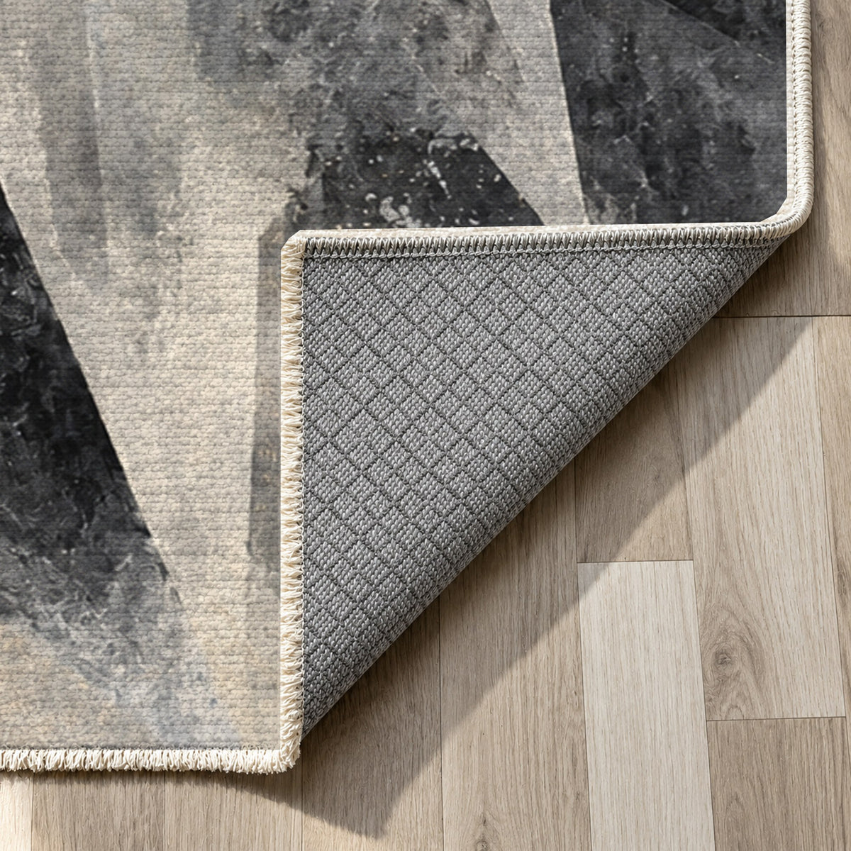 Ice Crystals Charcoal Abstract Washable Rug — backing close up