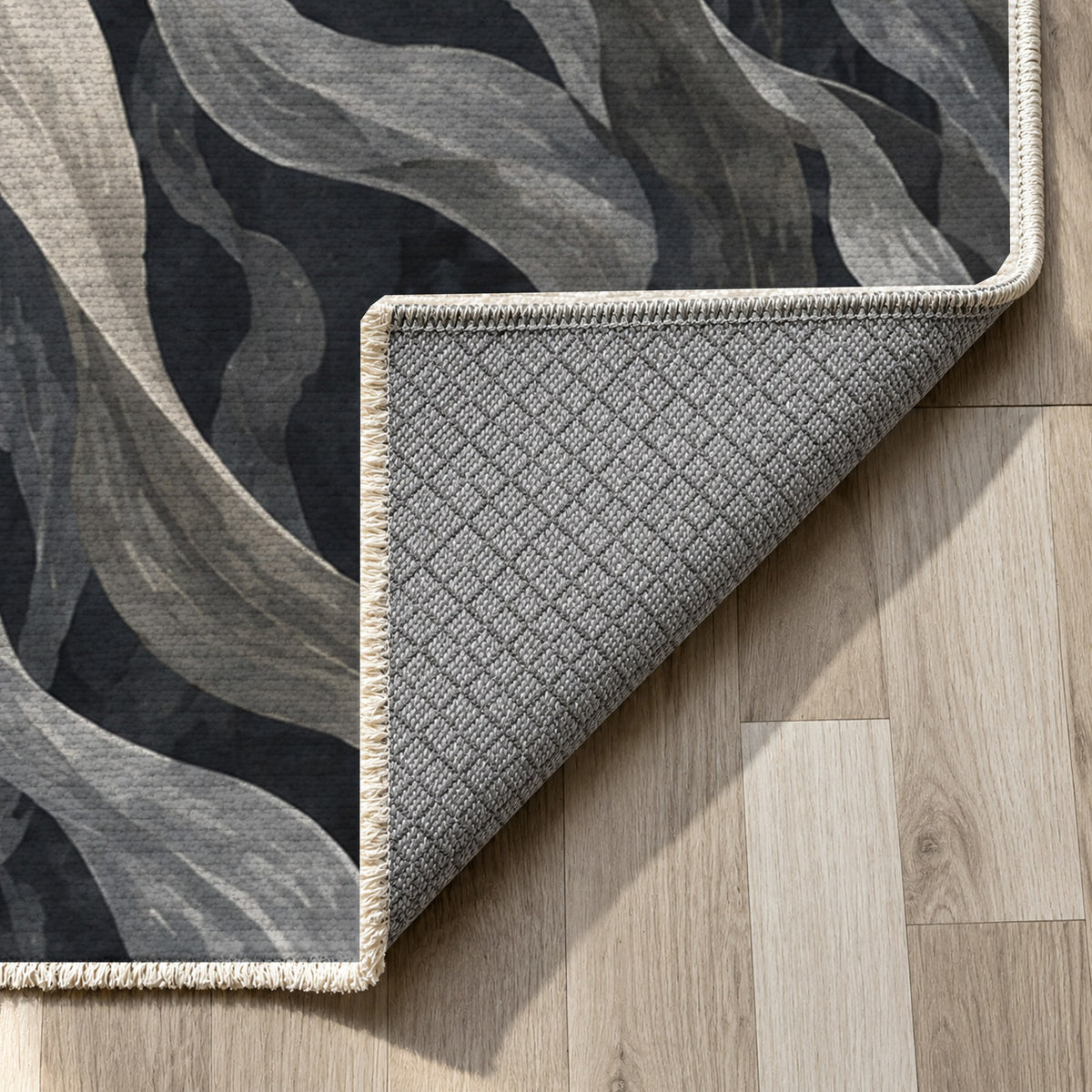 Kelp Forest Charcoal Abstract Washable Rug — backing close up