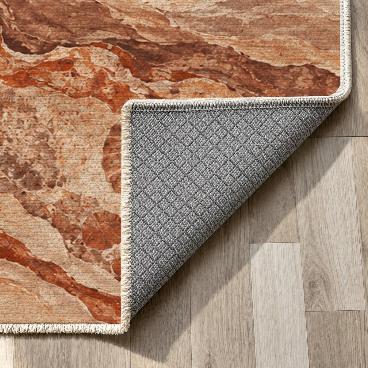 Limestone Fossils Terracotta Abstract Washable Rug — backing close up