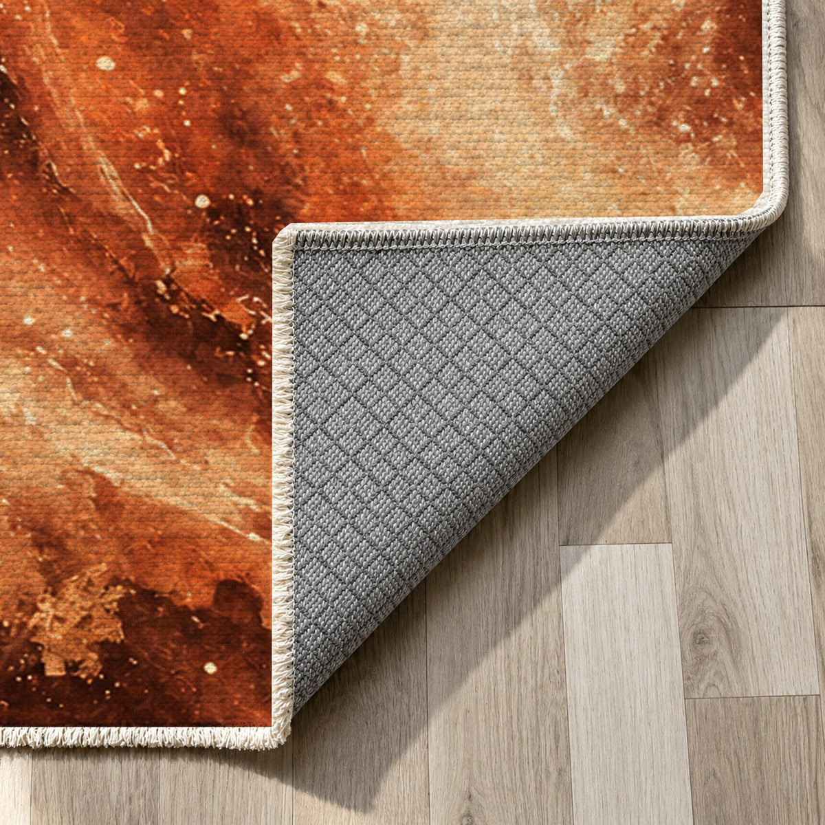 Milky Ribbons Terracotta Abstract Washable Rug — backing close up