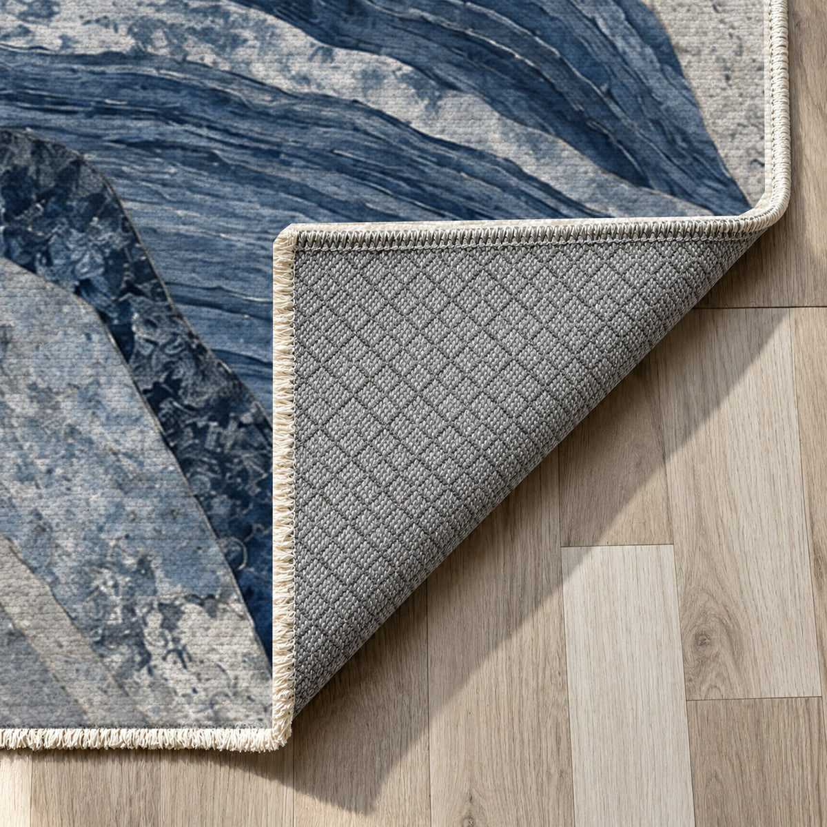Mineral Fragments Indigo Abstract Washable Rug — backing close up