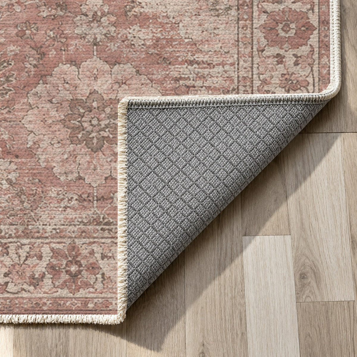 Misty Rosettes Rose Pink Vintage Washable Rug — backing close up