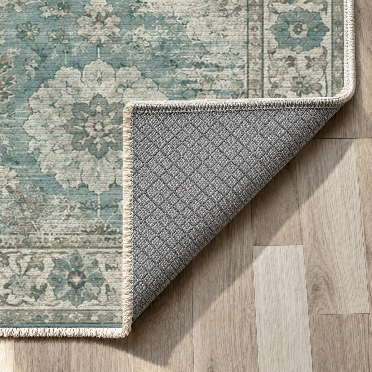 Misty Rosettes Turquoise Blue Vintage Washable Rug — backing close up