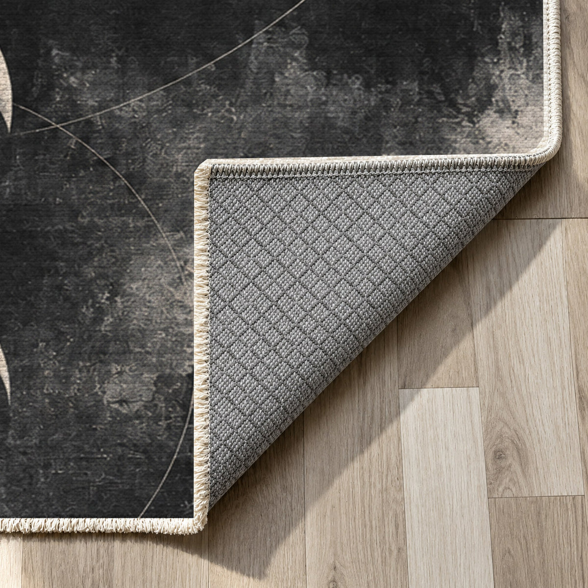 Moon Phases Charcoal Abstract Washable Rug — backing close up