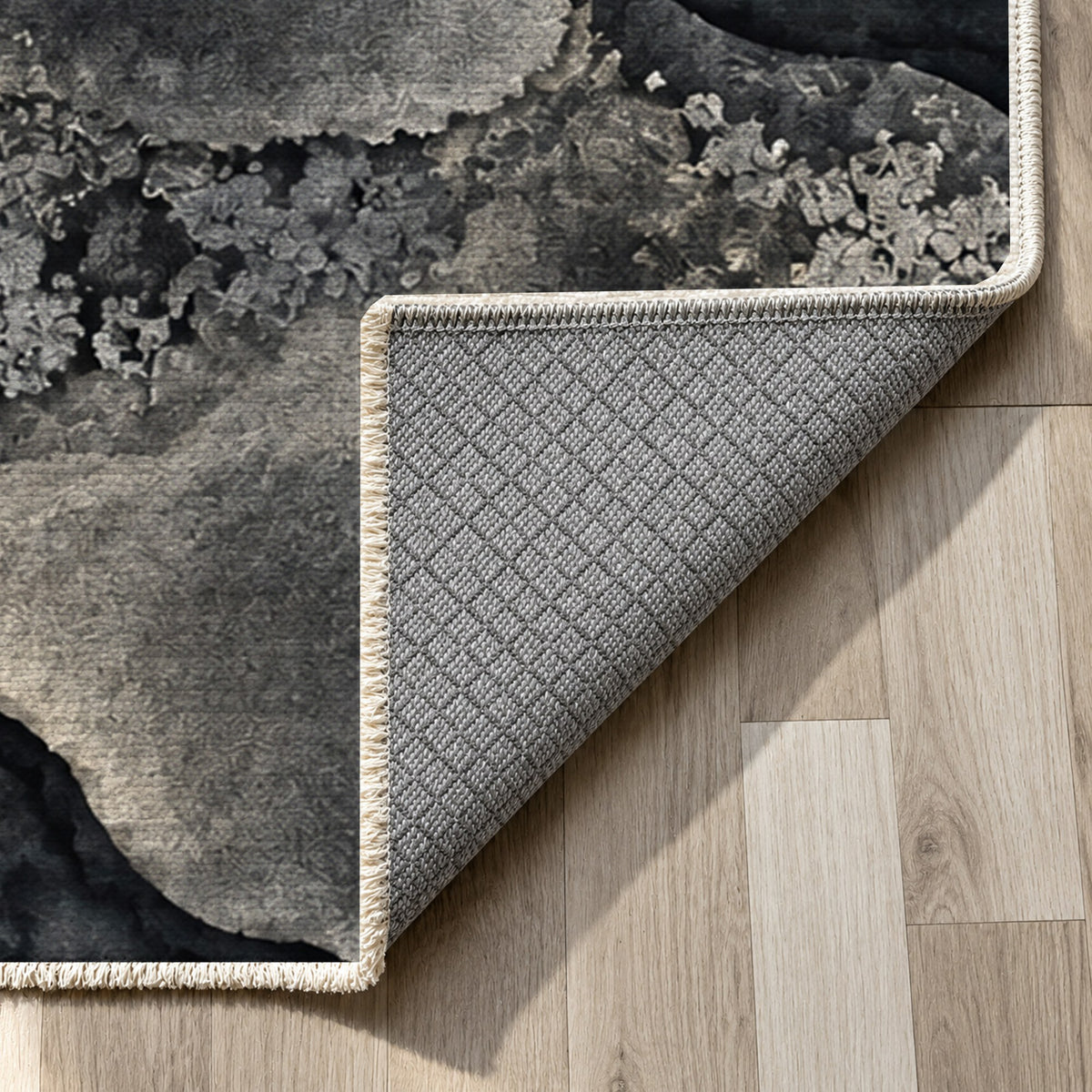 Moss Islands Charcoal Floral Washable Rug — backing close up