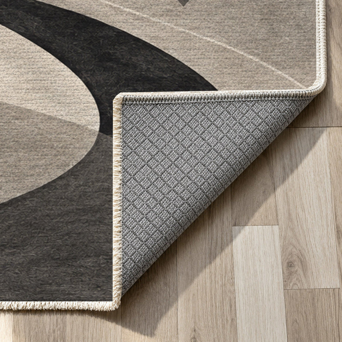 Nomad Paths Charcoal Modern Washable Rug — backing close up