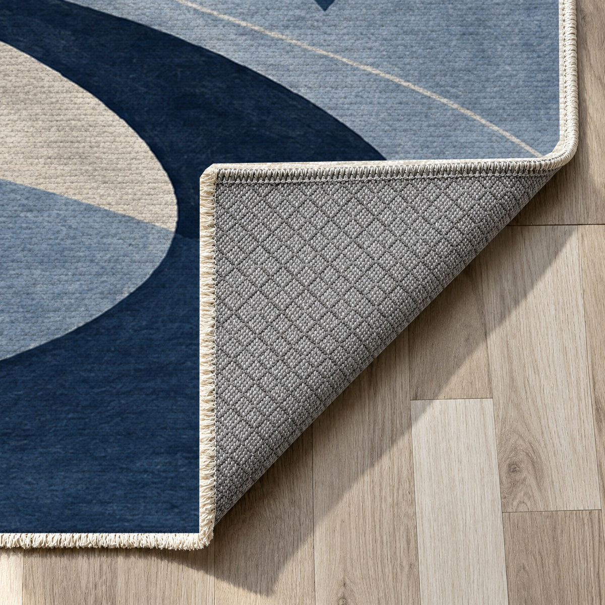 Nomad Paths Indigo Modern Washable Rug — backing close up