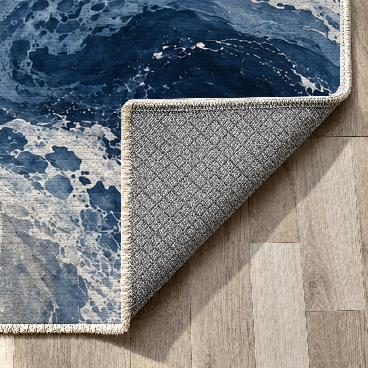 Ocean Currents Indigo Abstract Washable Rug — backing close up