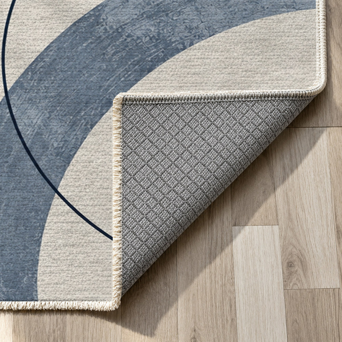Orbit Rhythm Blue Grey Modern Washable Rug — backing close up