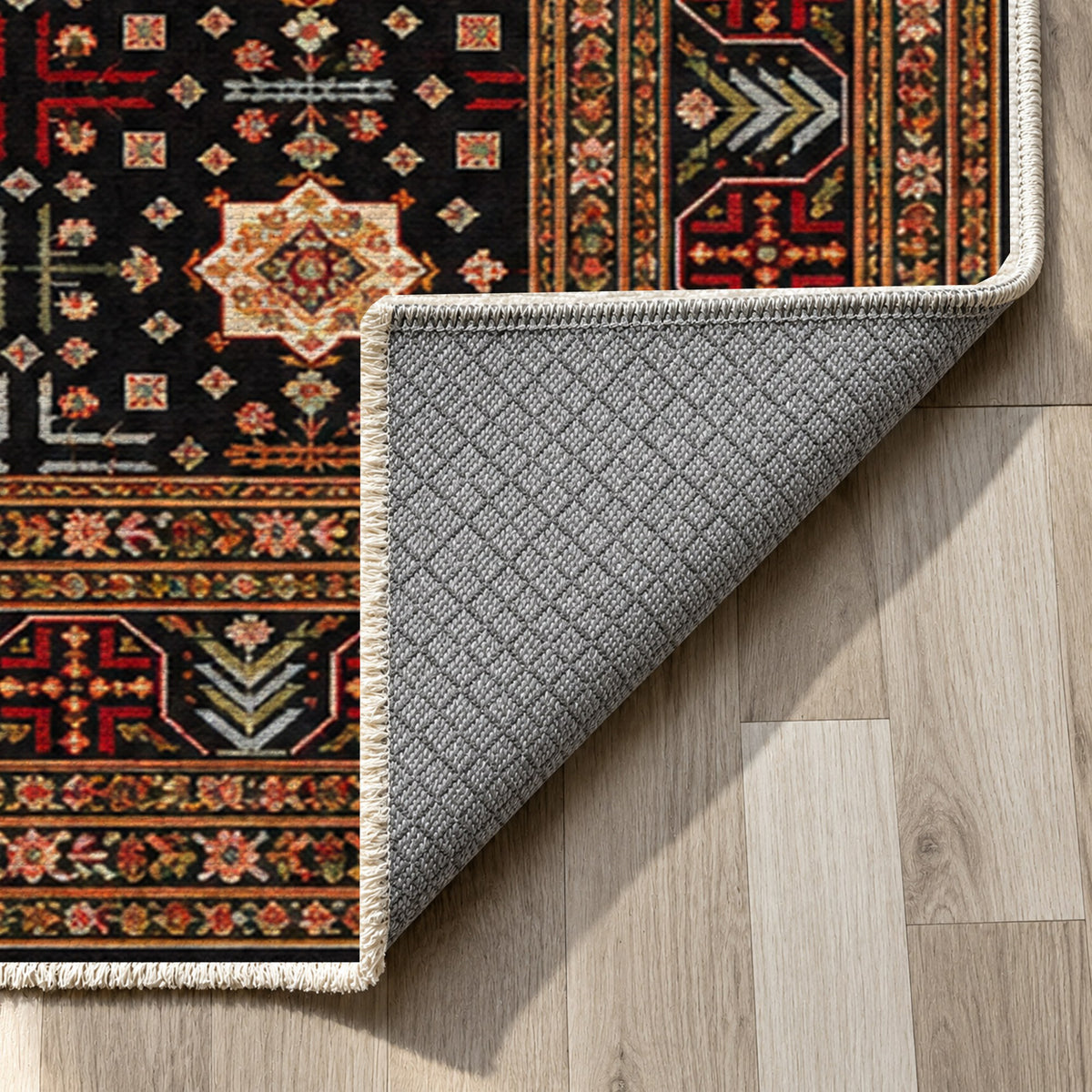 Ornamental Geometric Black Multicolor Ethnic Washable Rug — backing close up