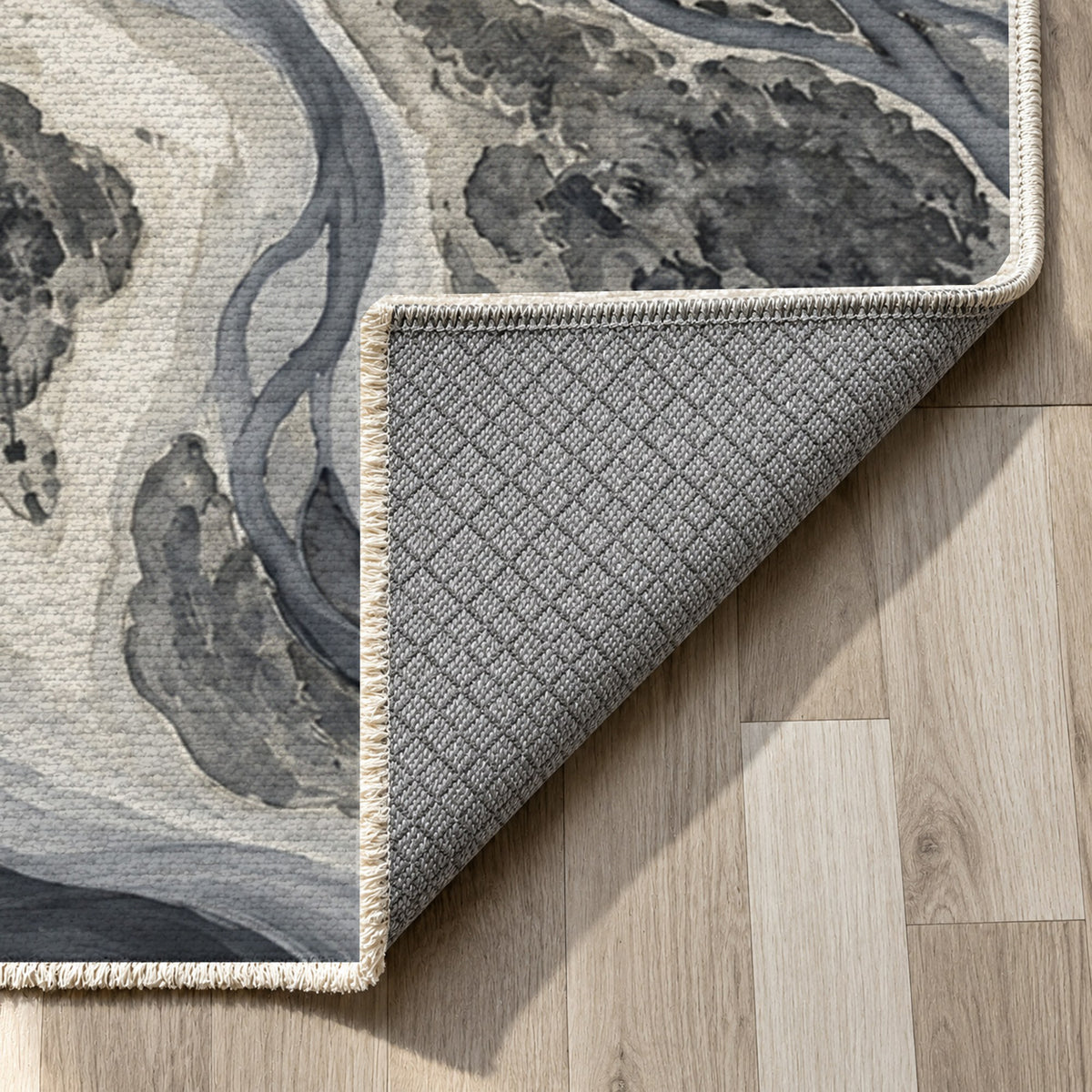 River Delta Charcoal Abstract Washable Rug — backing close up