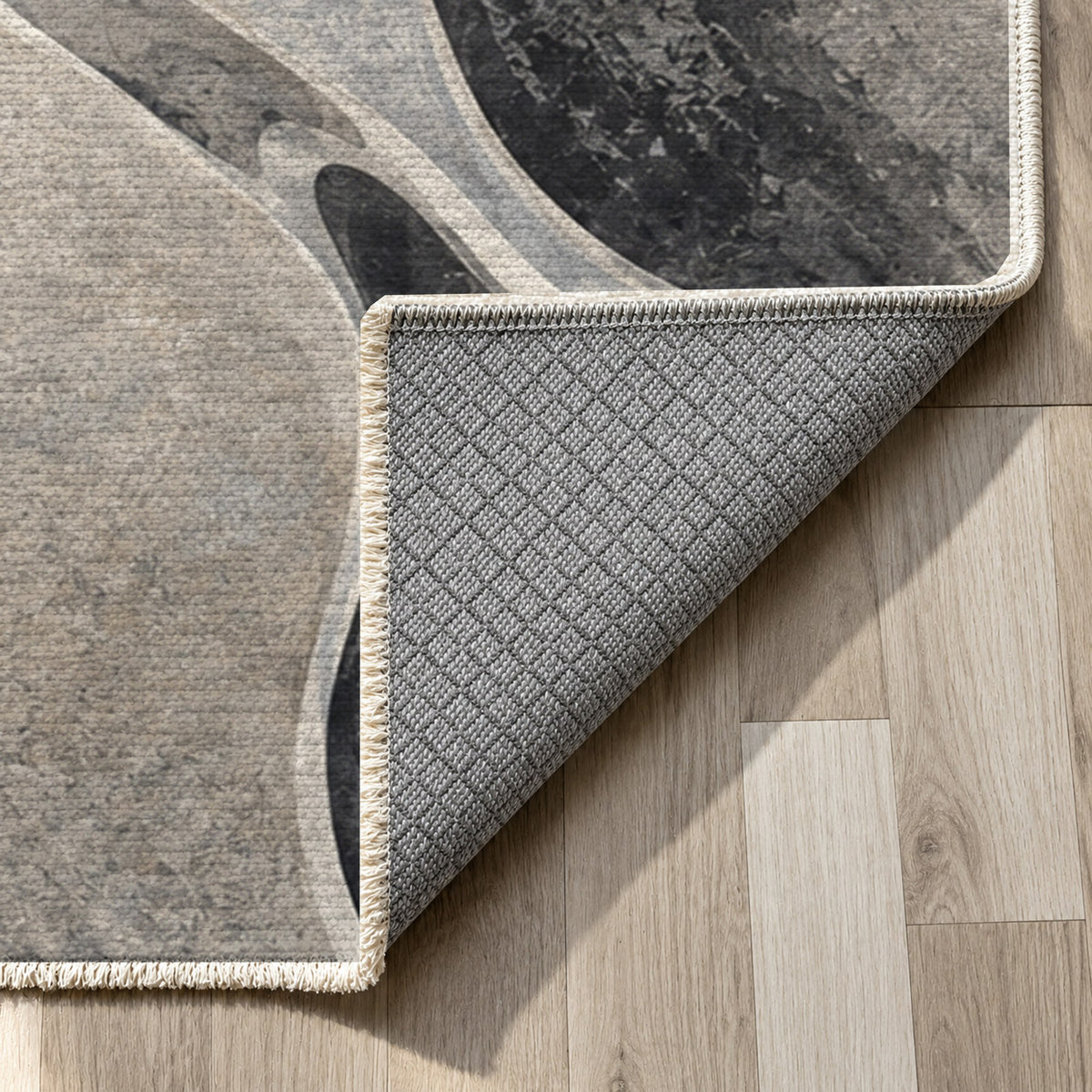 River Stones Charcoal Abstract Washable Rug — backing close up