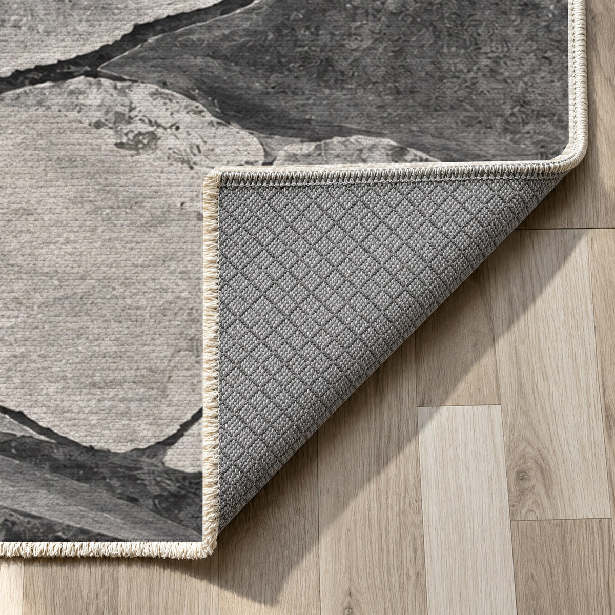 Salt Flats Charcoal Modern Washable Rug — backing close up
