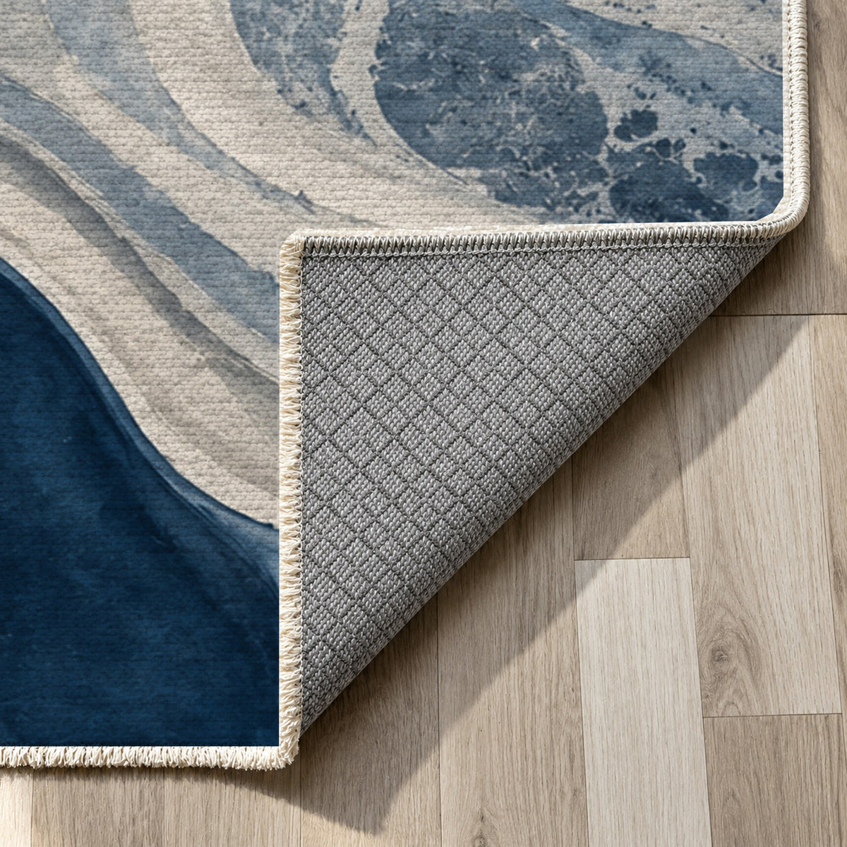 Sandbar Ribbons Indigo Abstract Washable Rug — backing close up