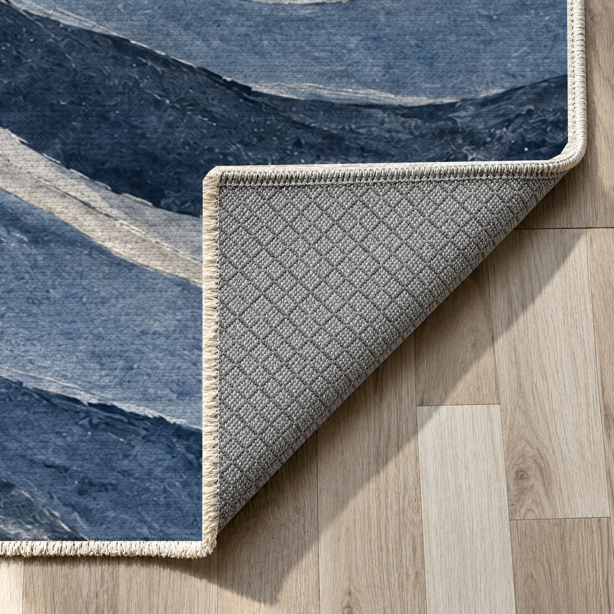 Sandstone Bands Indigo Abstract Washable Rug — backing close up