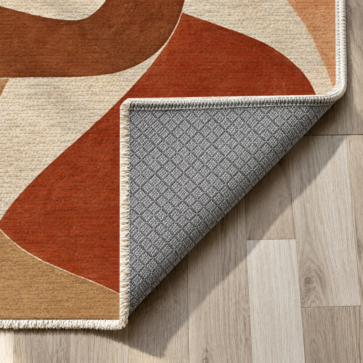 Shared Gestures Terracotta Abstract Washable Rug — backing close up