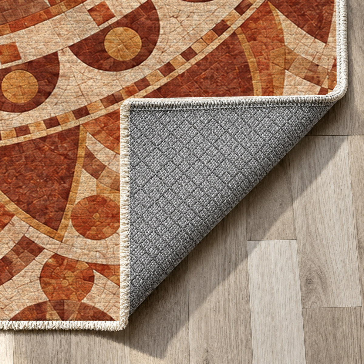 Sun Wheel Terracotta Geometric Washable Rug — backing close up
