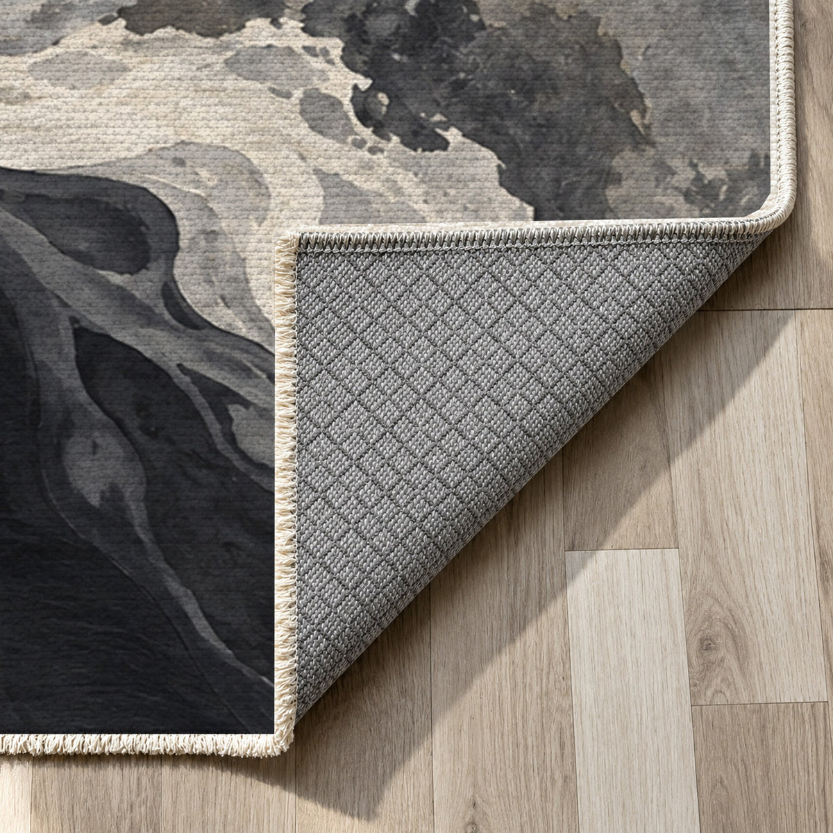 Tidal Islands Charcoal Abstract Washable Rug — backing close up