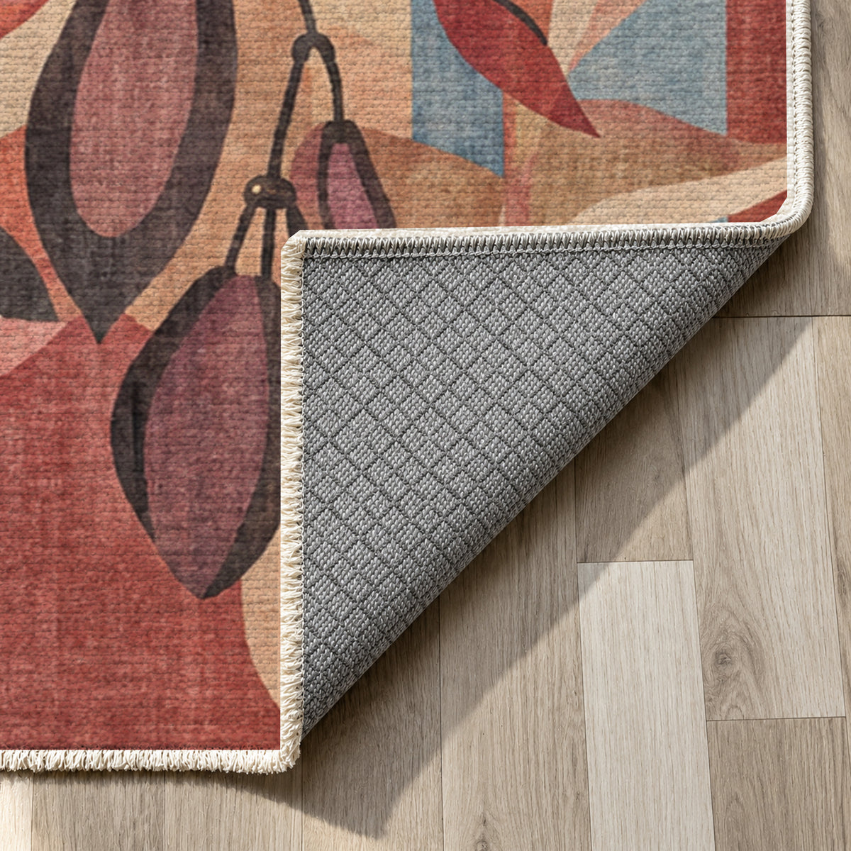 Tropic Blush Floral Washable Rug — backing close up