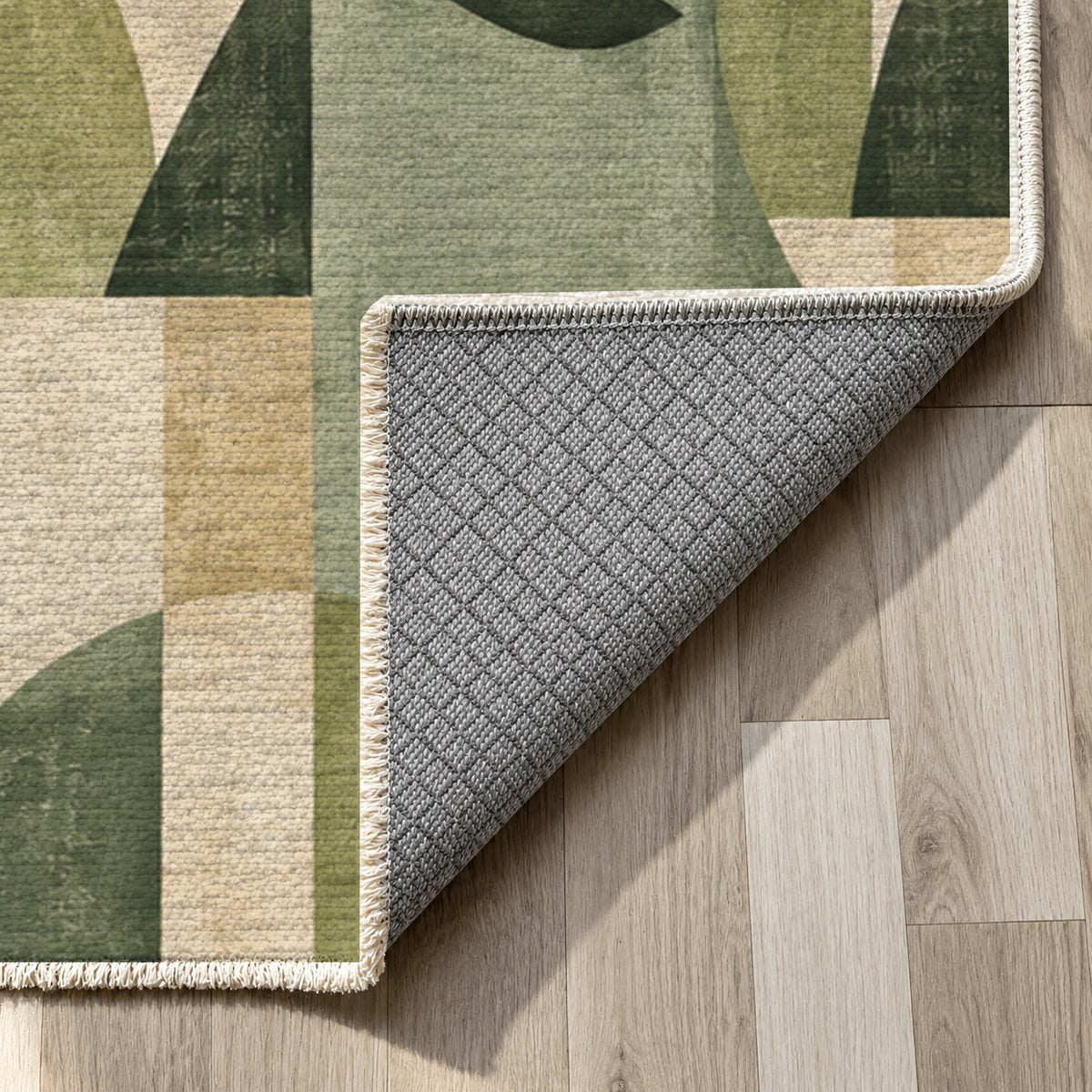 Urban Faces Sage Abstract Washable Rug — backing close up