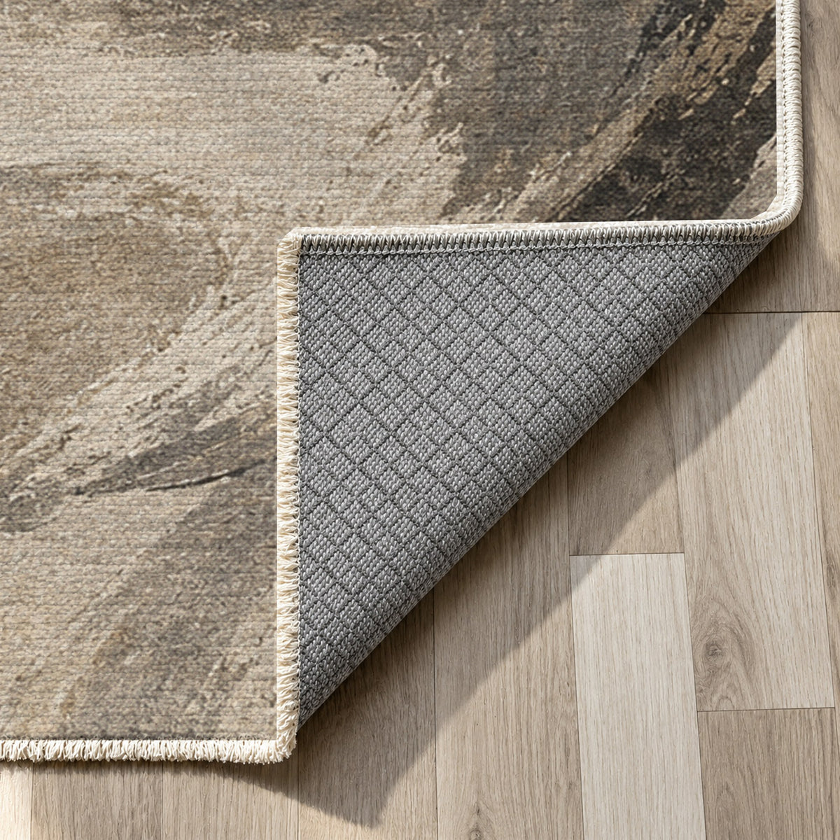 Wind Script Ivory Taupe Abstract Washable Rug — backing close up